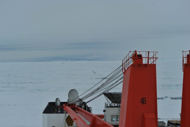 A photograph sent in by the captain of the Russian ship suggests that the two vessels can actually see each other, albeit as a tiny speck on the horizon